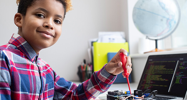 Homeschool student participating in online STEM activity.