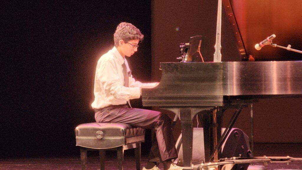 Rehan playing the piano