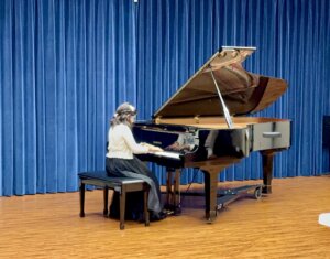 Charvi in playing piano