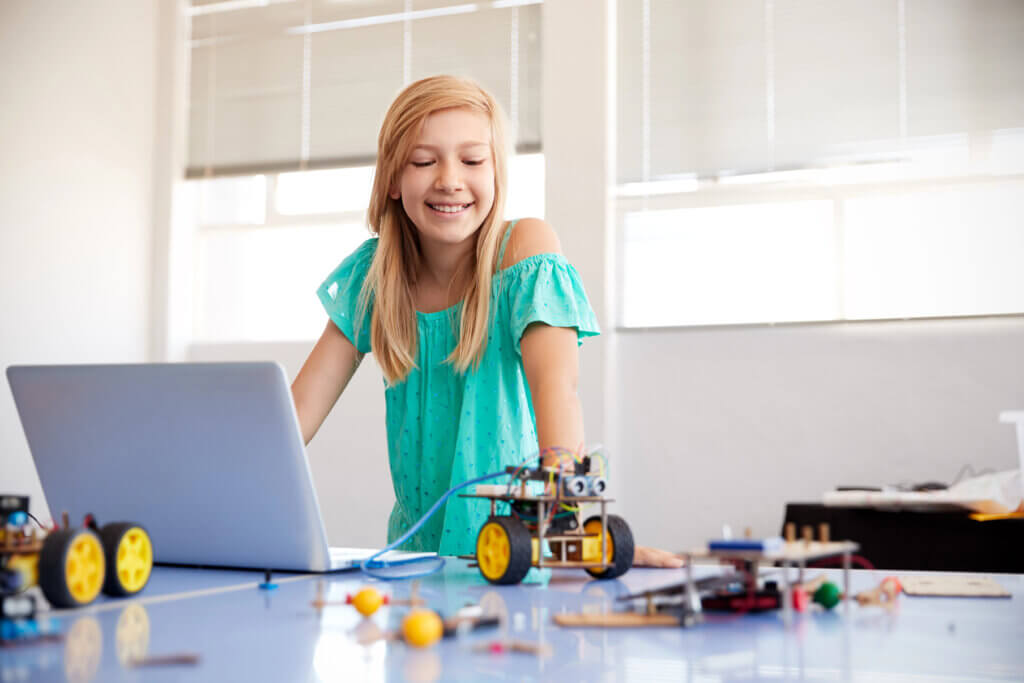 Girl working with robotics