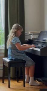 Eleanor playing piano