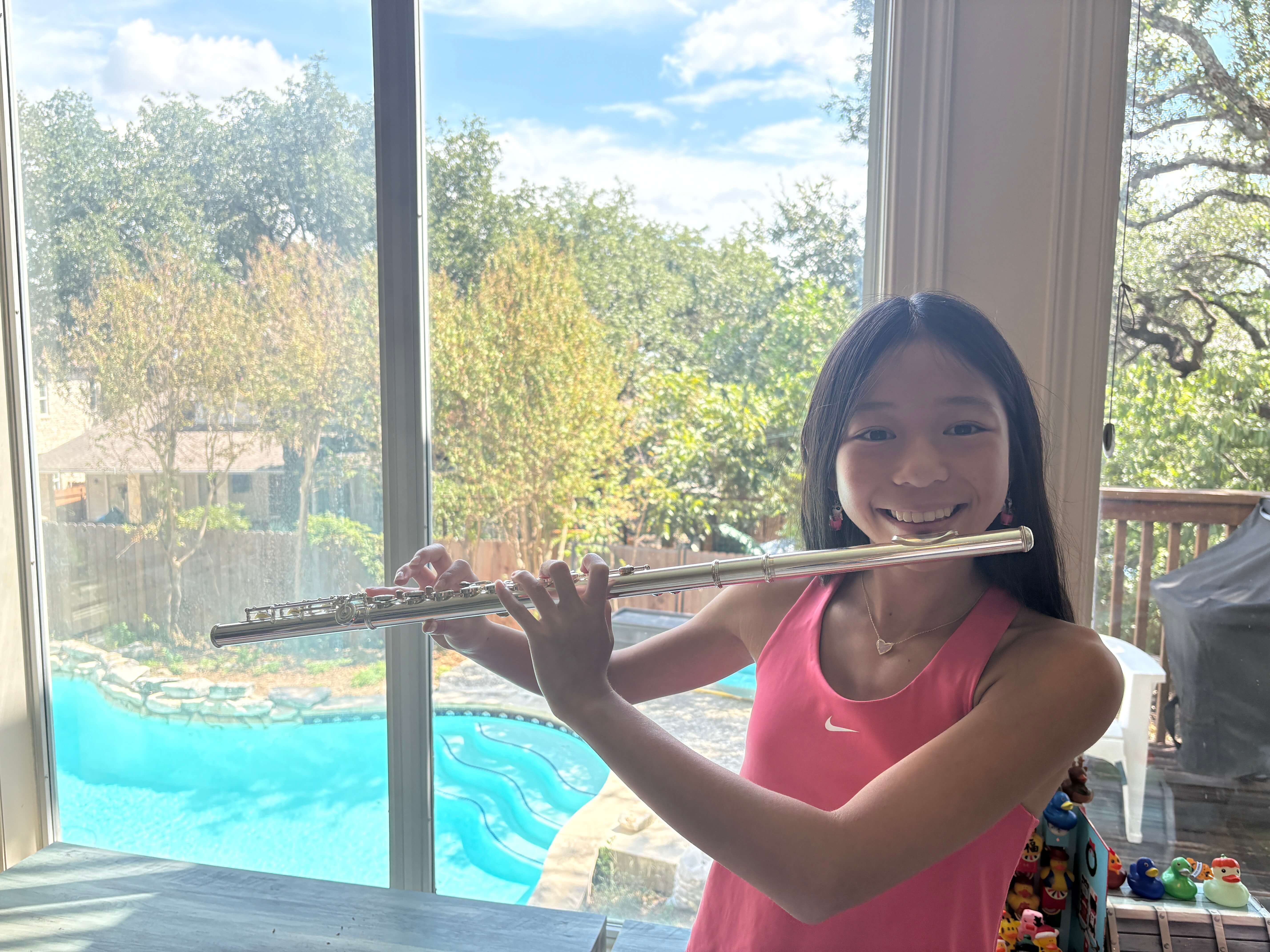 Kayla playing the flute