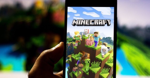 Kids playing minecraft on mobile phone